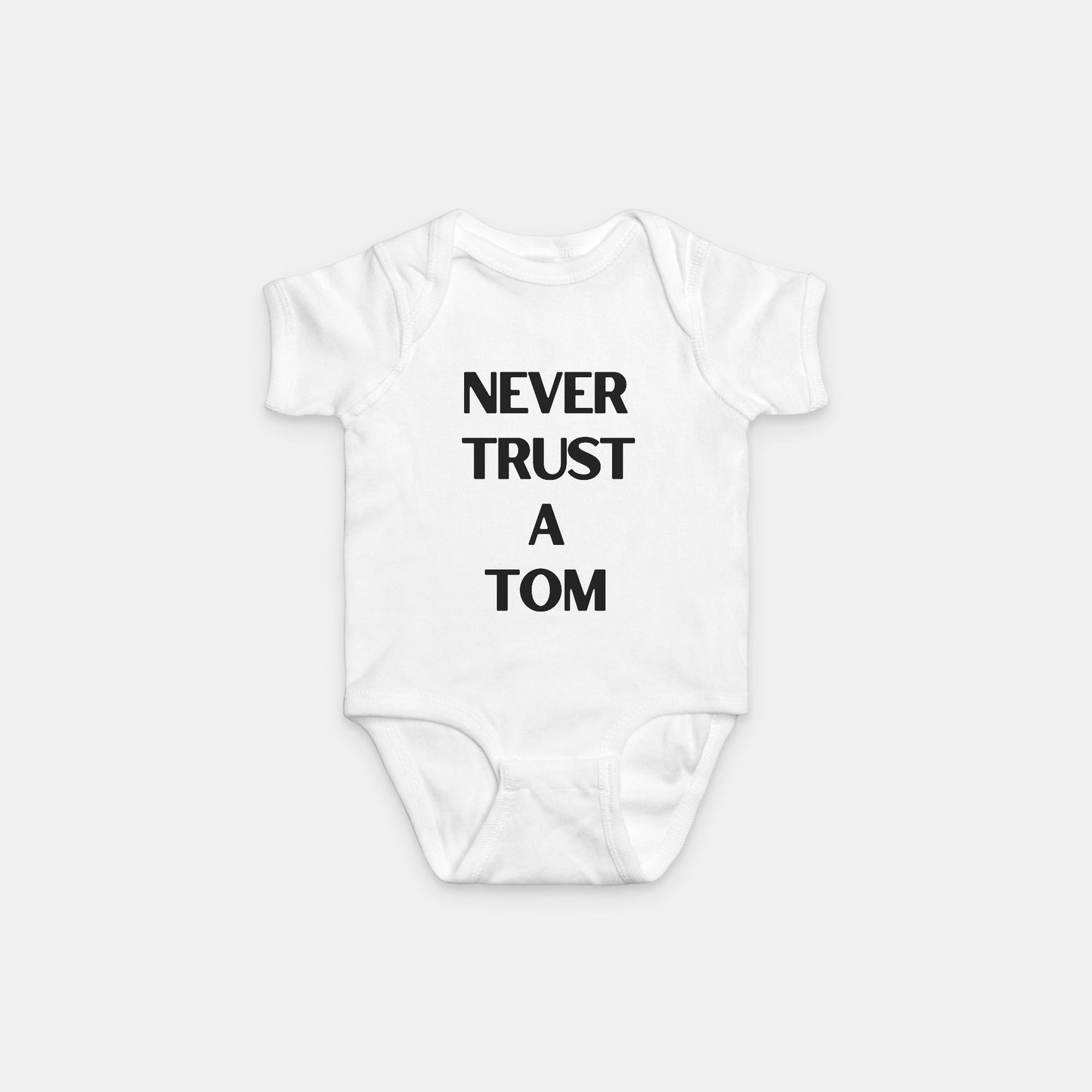 Never Trust A Tom Baby Onesie